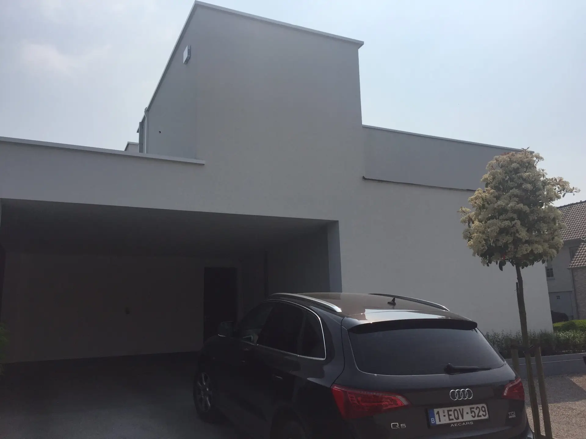 Crepigevel van de aanbouw bij een bestaande woning in Waregem