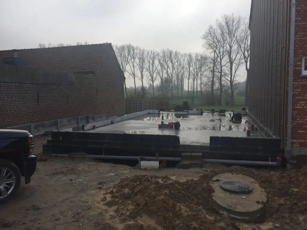 Fundering voor de nieuwbouwwoning in houtskeletbouw in Voorde
